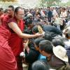 Aenpo Kyabgon bestowing empowerment/blessing to thousands of disciples in Tibet.